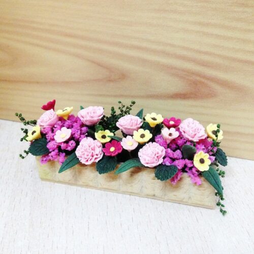 Miniature Flowers In A Wooden Box