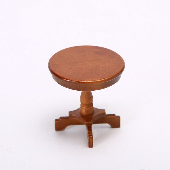 A small wooden table on a white background.